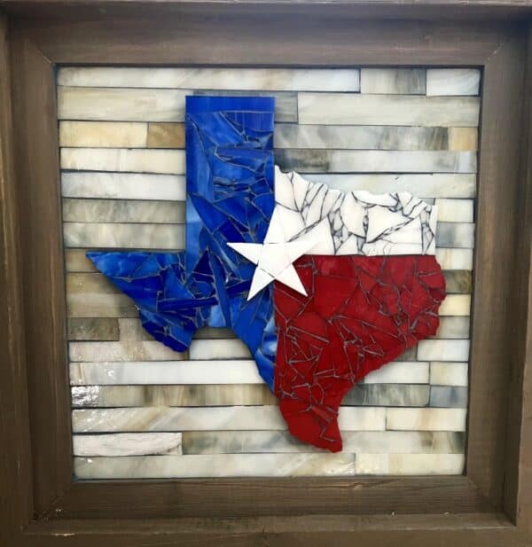 A picture of the state of texas made out of glass.